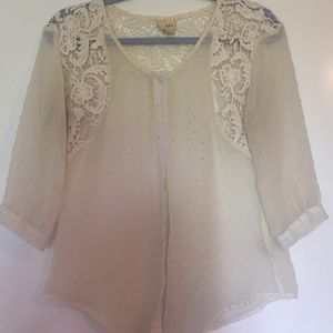Cream long sleeve blouse with lace.